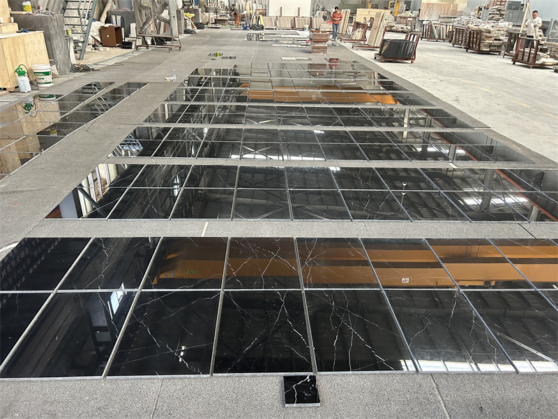 black and marble kitchen