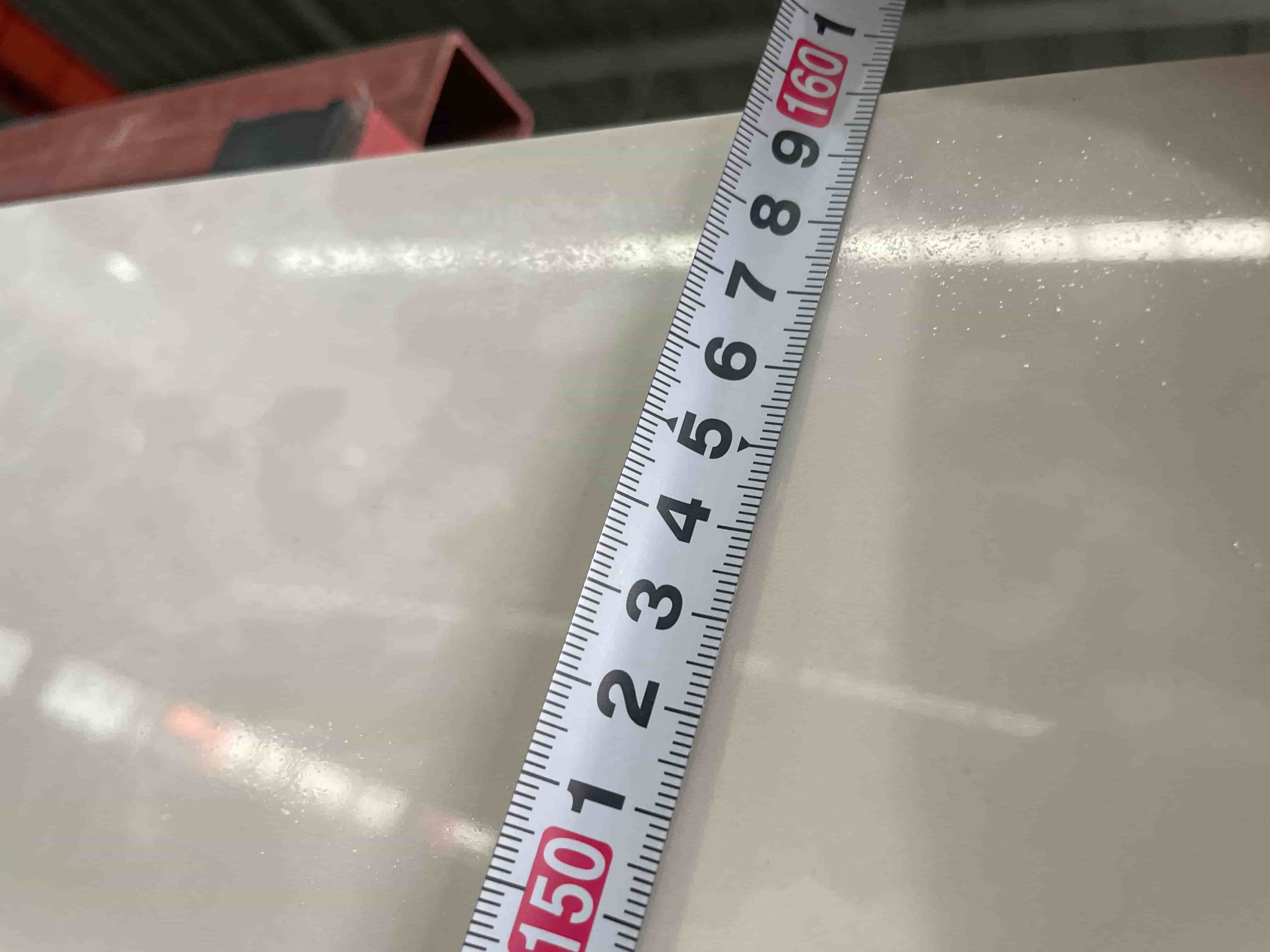 Hetian White Jade sintered stone slab height measurement before shipment