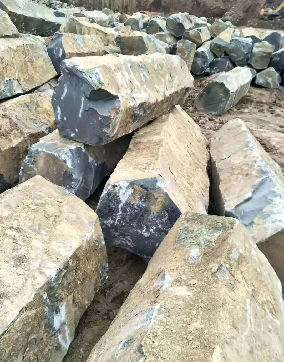 Mongolian Black basalt blocks awaiting cutting and fabrication at the factory