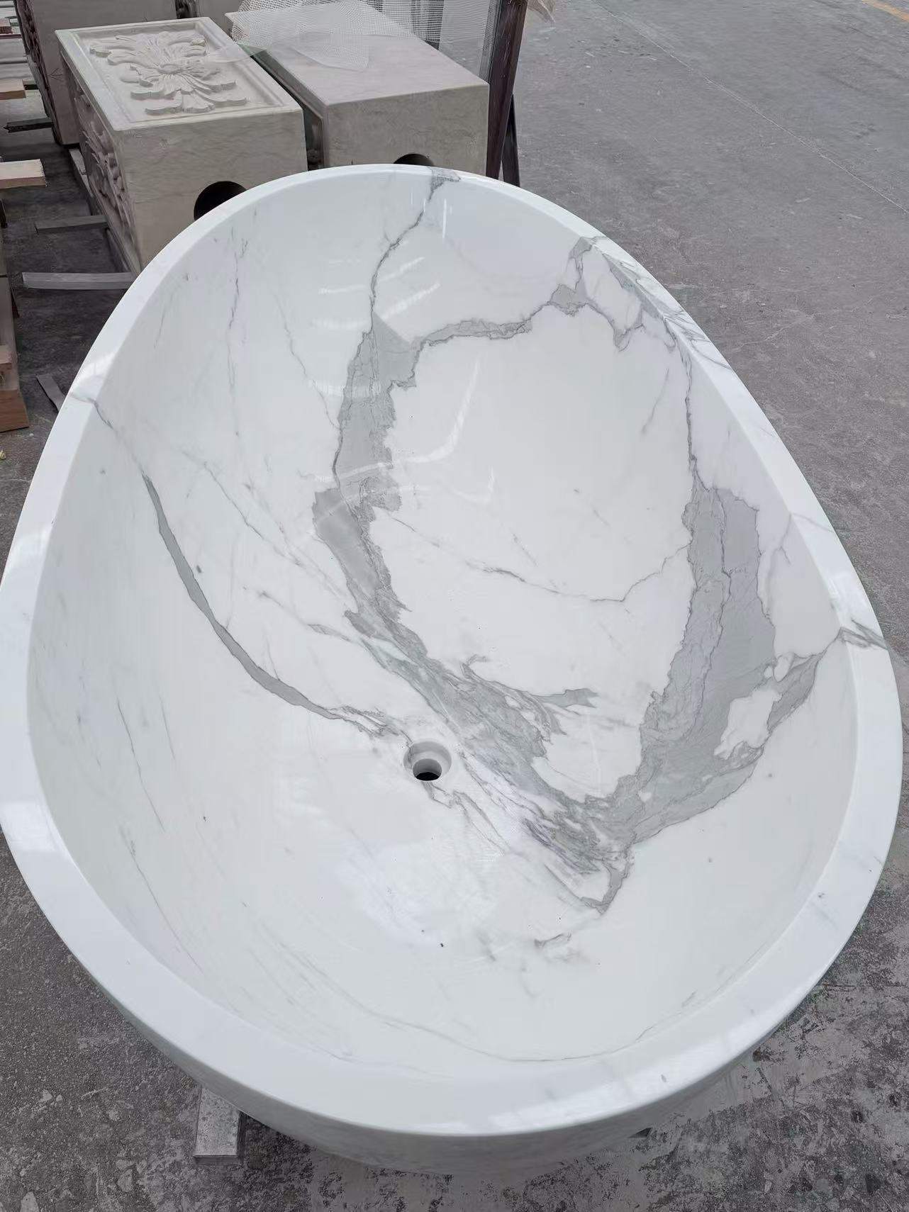 Custom Calacatta White marble bathtub viewed from above
