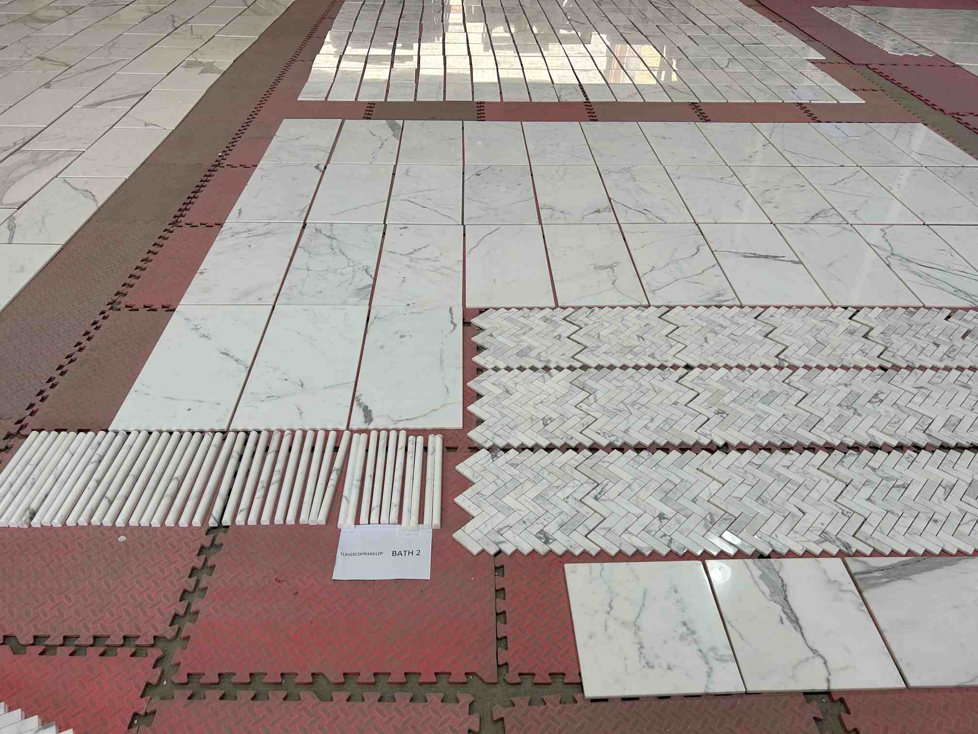 Calacatta White decorative pattern and wall tiles pre-laid for a project