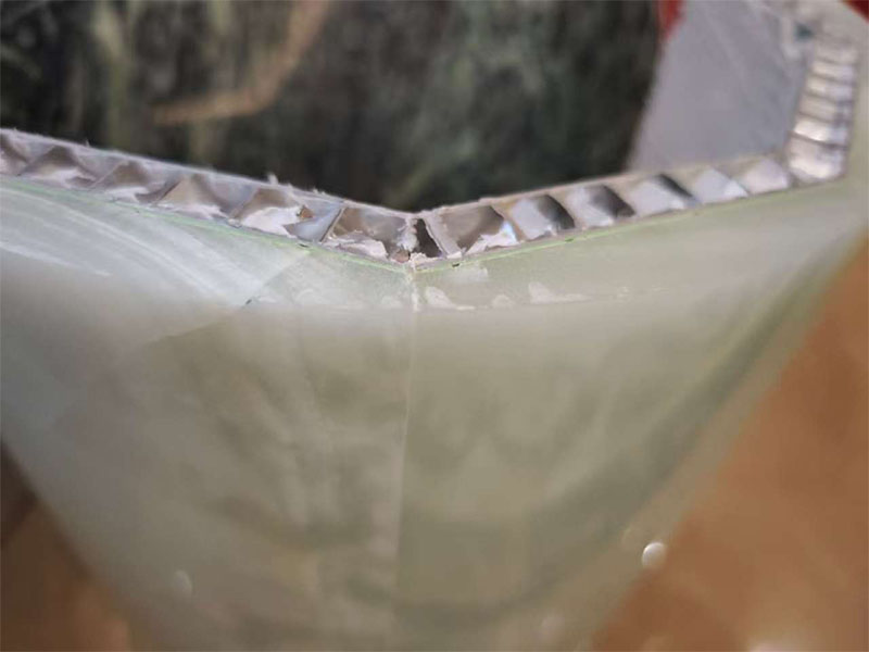 Curved marble panel with backing added behind the natural-stone face.