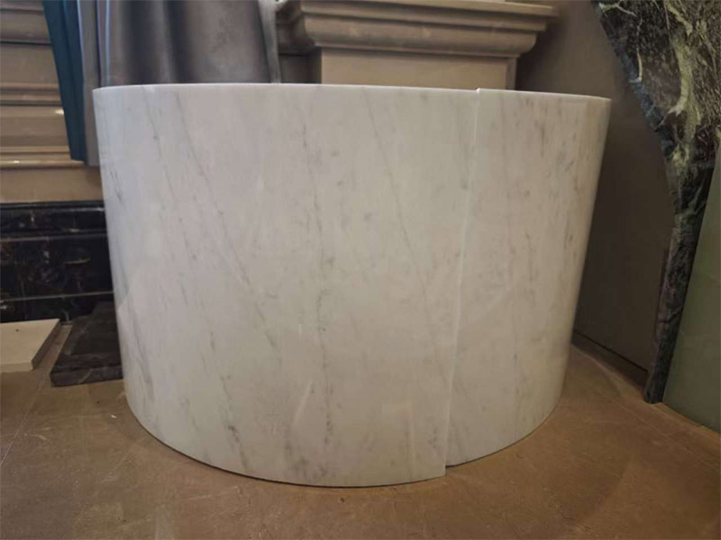 Marble segments used to build a curved stone facing.